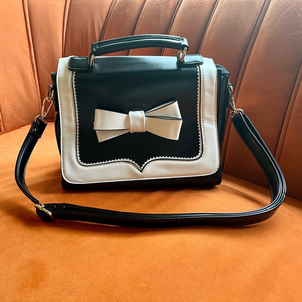 Royal Monk black and white bow tie handbag